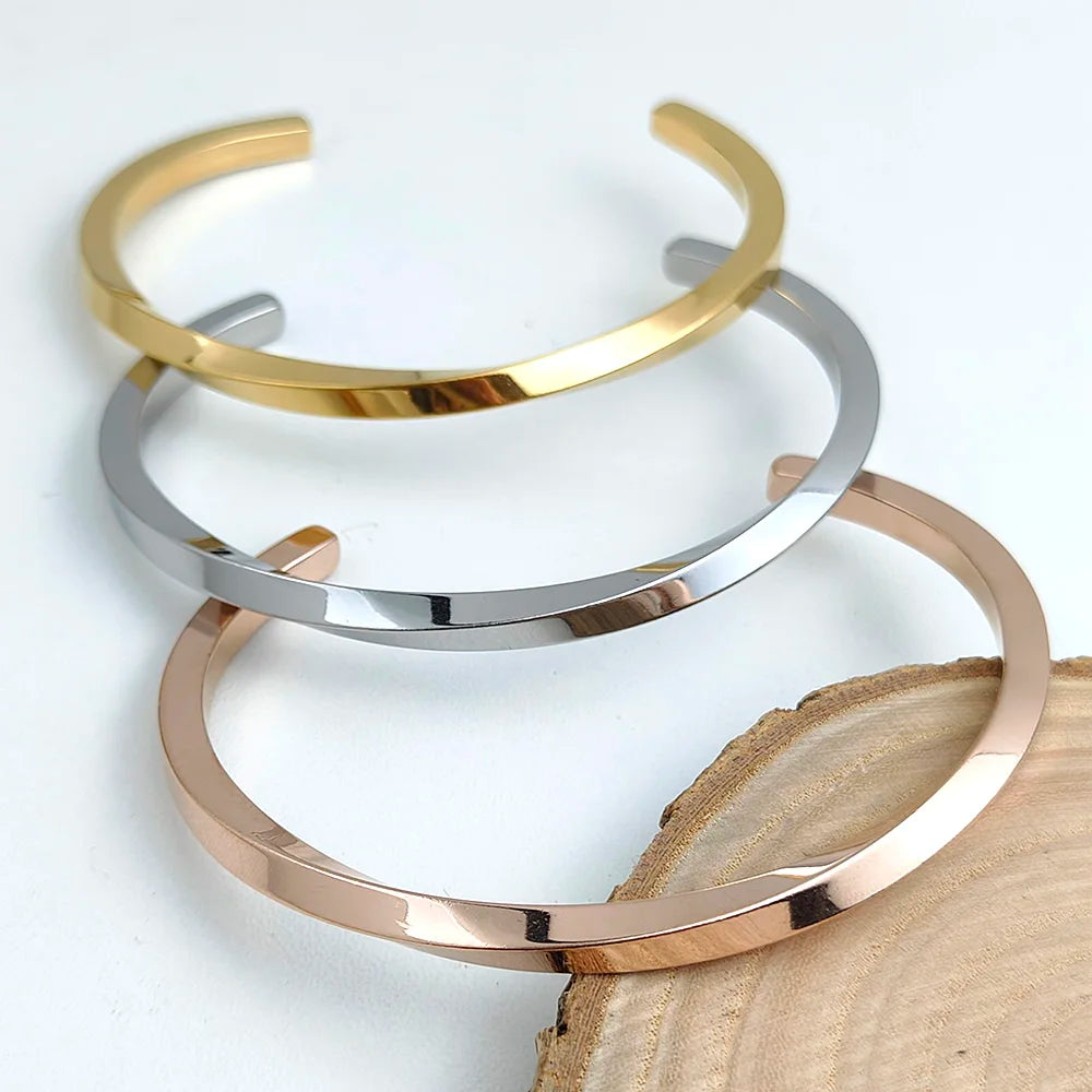 Metal lady's bracelet. Simple opening rotating rhombic stainless steel brooch. Jewelry for the wife's wedding party.