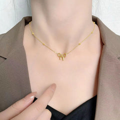 Classic Stainless Steel Bow Charm Jewelry Set – Necklace, Bracelet & Earrings