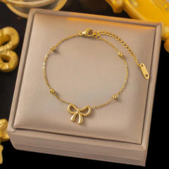 Classic Stainless Steel Bow Charm Jewelry Set – Necklace, Bracelet & Earrings