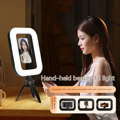 Rechargeable Handheld Ring Light with Adjustable Tripod Stand & Phone Holder. 3 Color Modes (Warm/Cool/Natural) & 10 Brightness