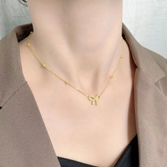 Classic Stainless Steel Bow Charm Jewelry Set – Necklace, Bracelet & Earrings